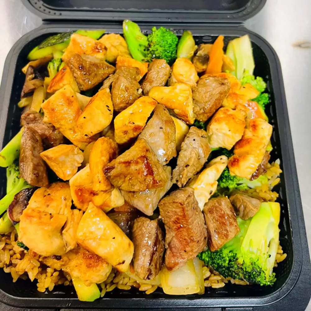 Hibachi steak chicken stir fry broccoli onion rice takeout box at Osaka Hibachi & Sushi, a Japanese Restaurant in Bainbridge